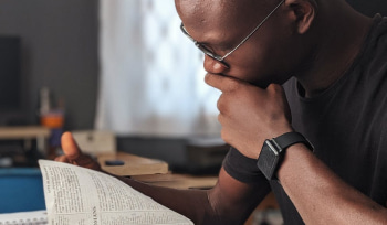 A man reading his book